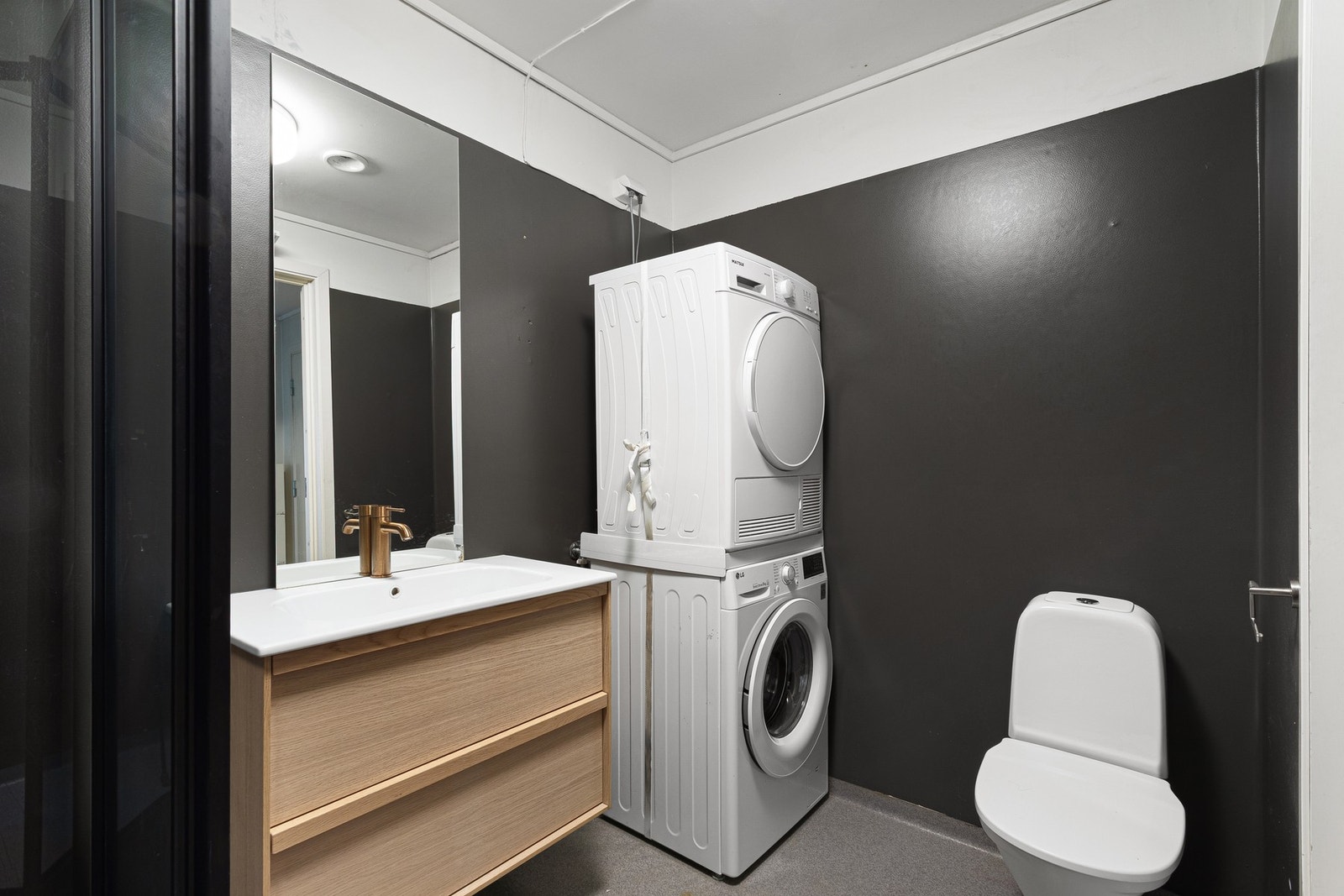 Det er opplegg til vaskemaskin i rommet. Galleribilde