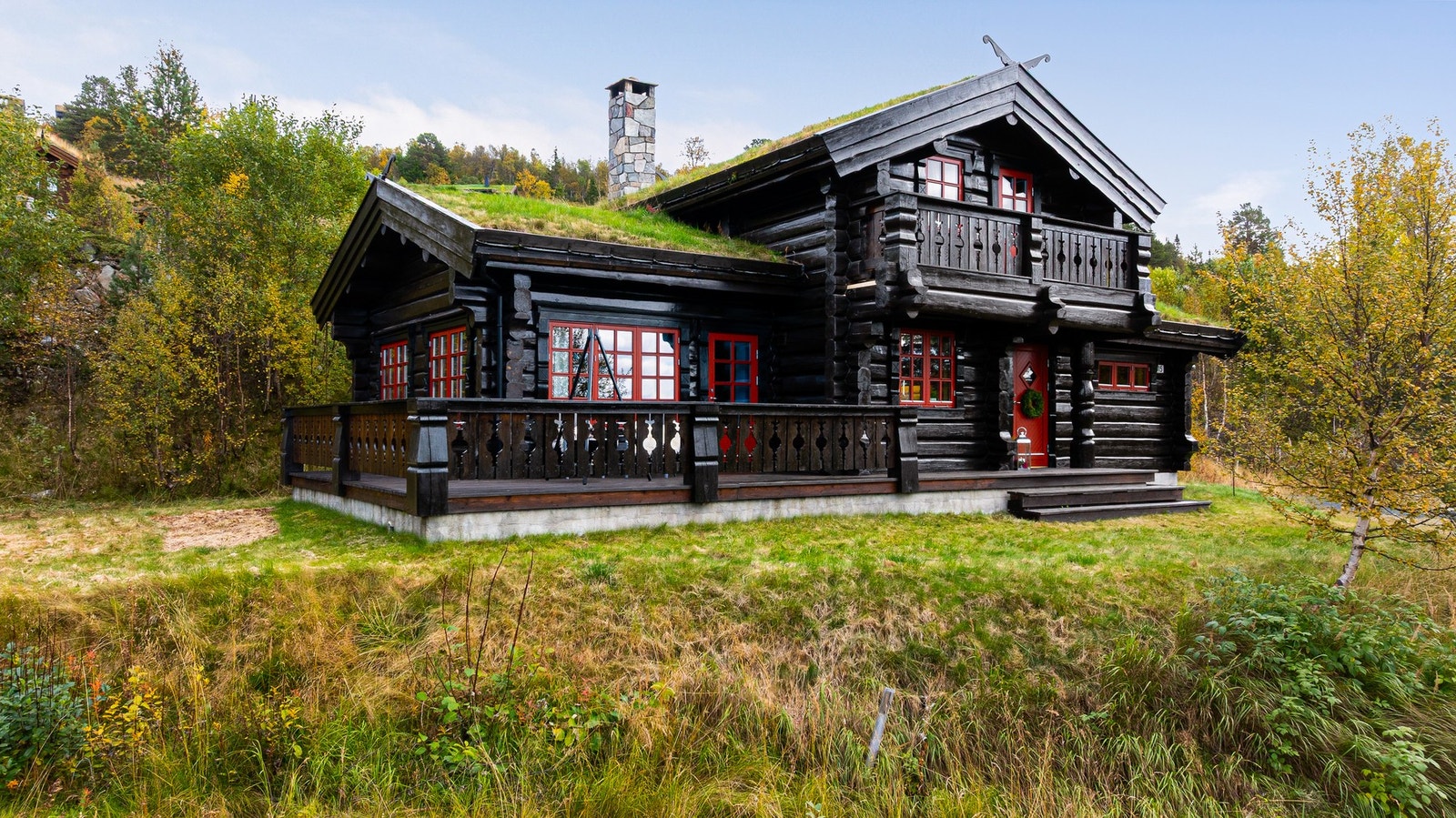 En flott laftet hytte med et gjennomført utrykk Galleribilde