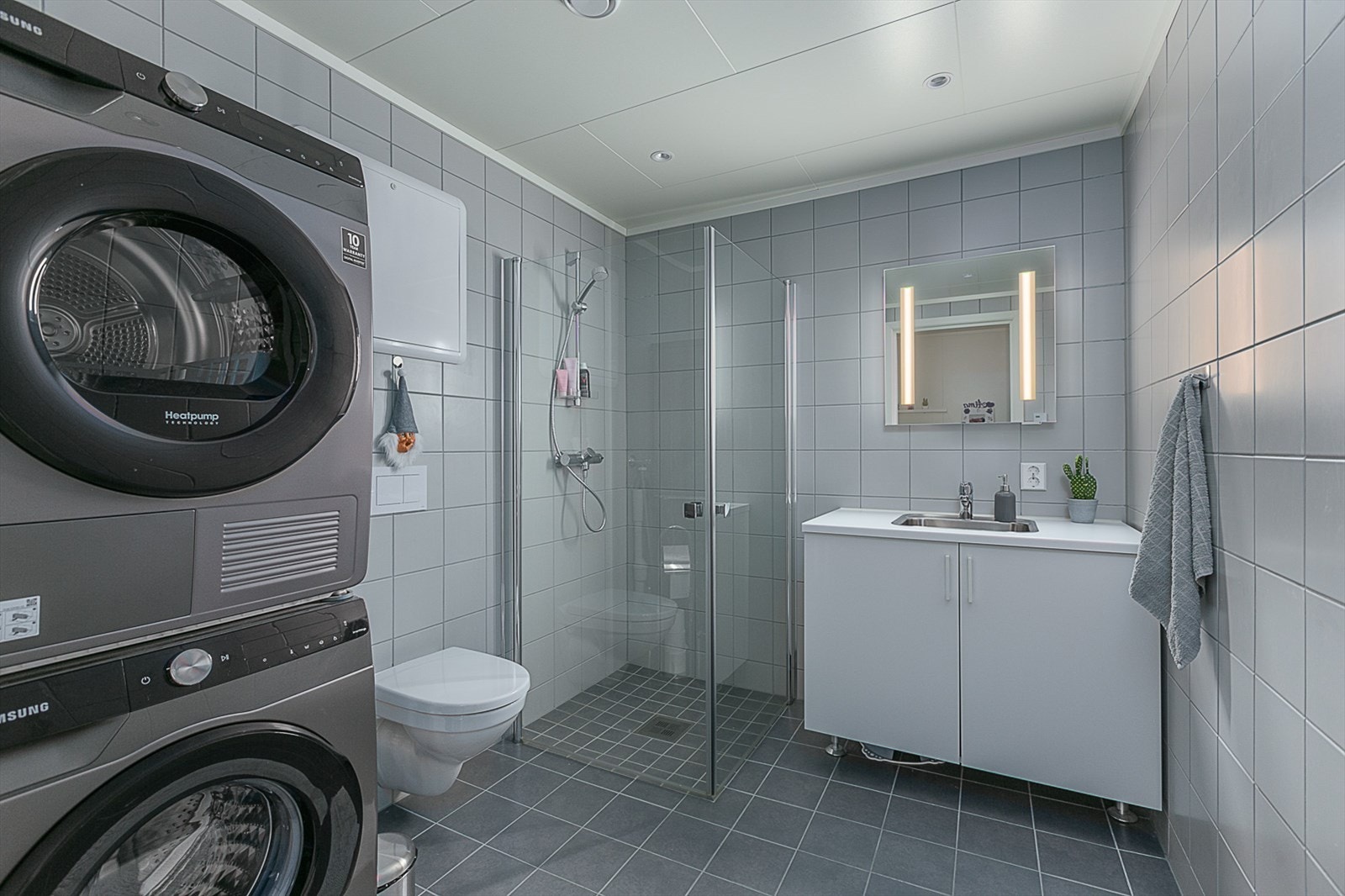 Bad/vaskerom med varme i gulv. Galleribilde