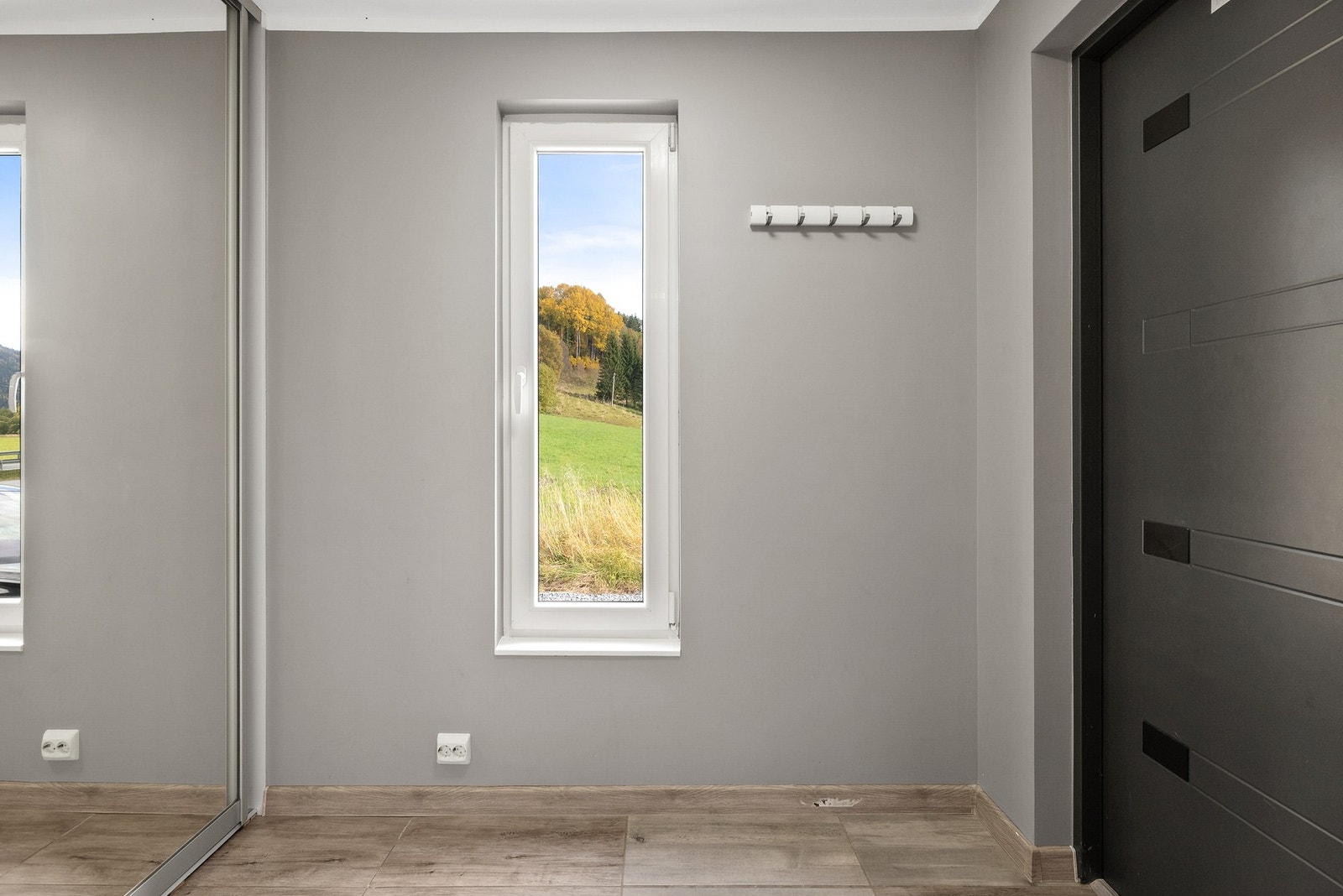 Entréen kombinerer god funksjonalitet med en varm velkomst Galleribilde