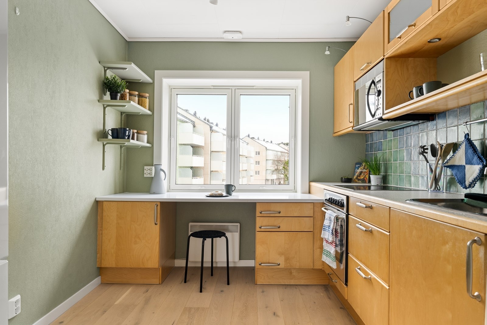 Kjøkkenet er på 7,7 kvm og har fått TG1 av takstmann. Galleribilde