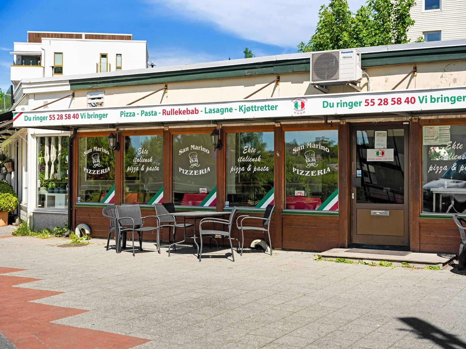 Den kjente pizzeriaen "San Marino" ligger på Landåstorget. Galleribilde