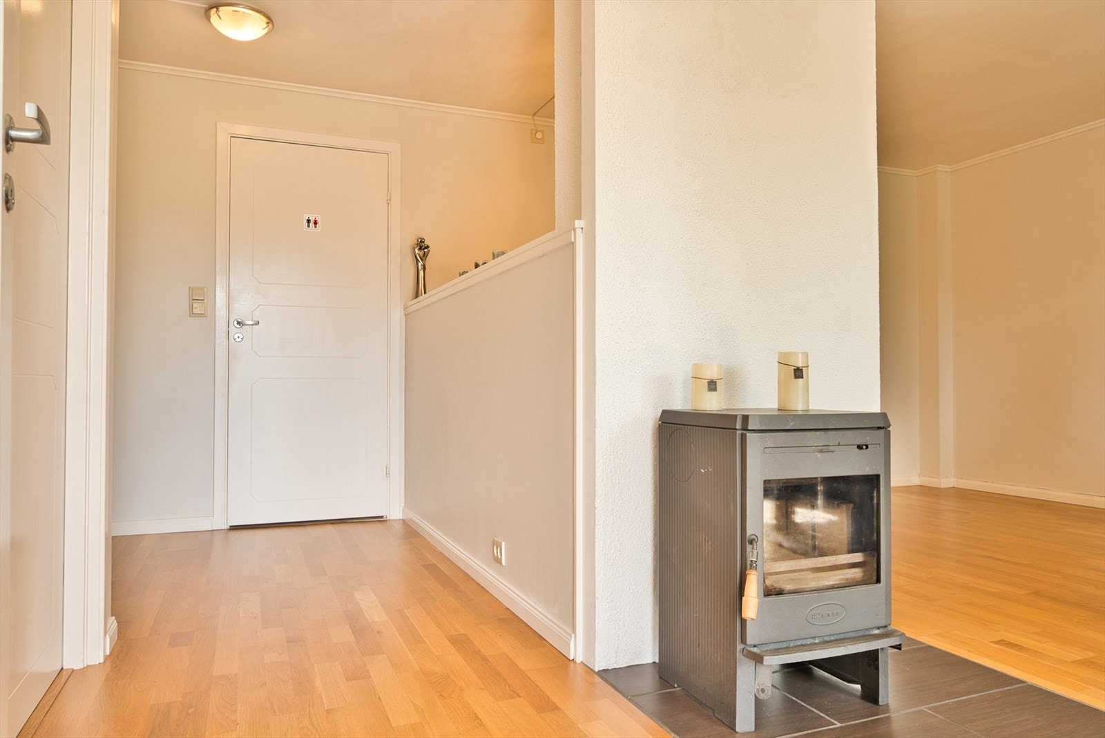 Med fyr i denne tilføres lun, god varme. Galleribilde