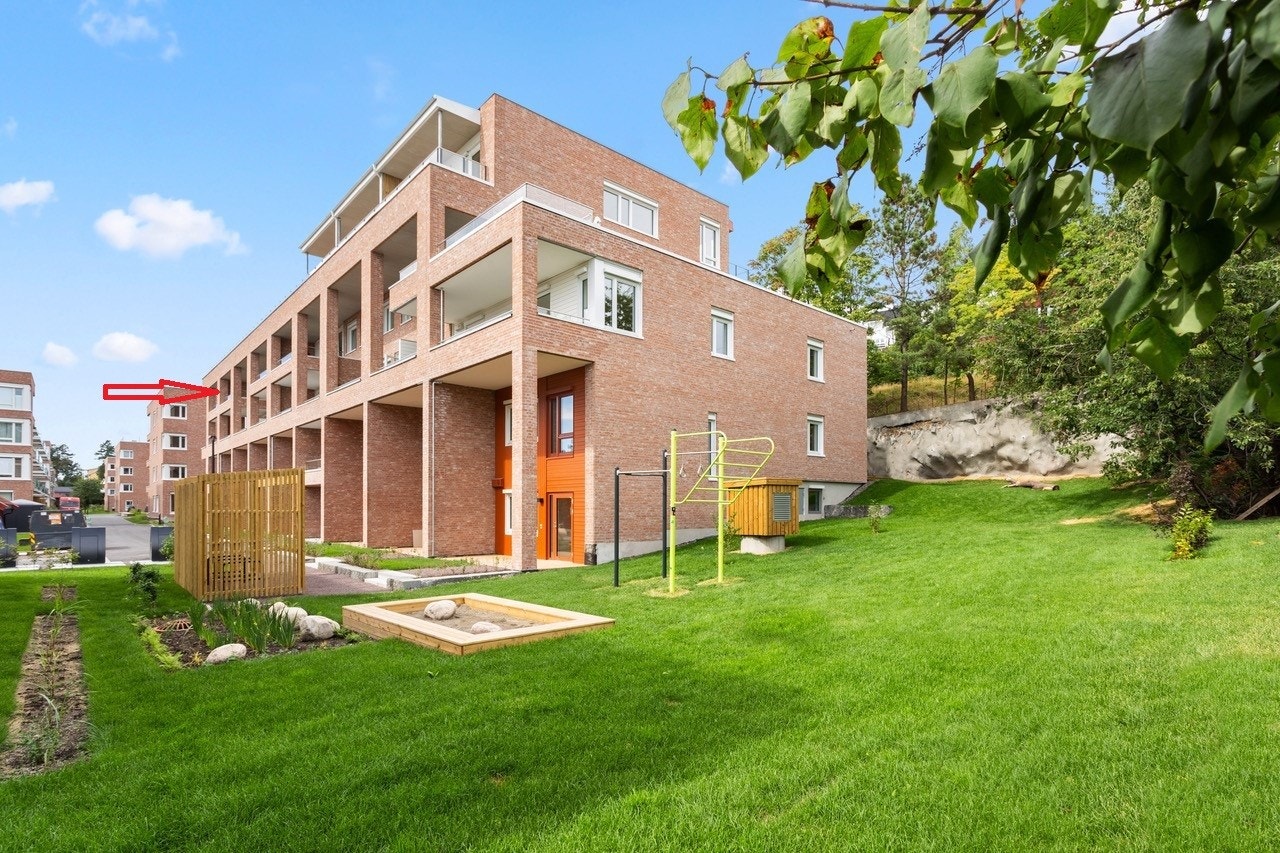 Mye grønt mellom byggene. Galleribilde