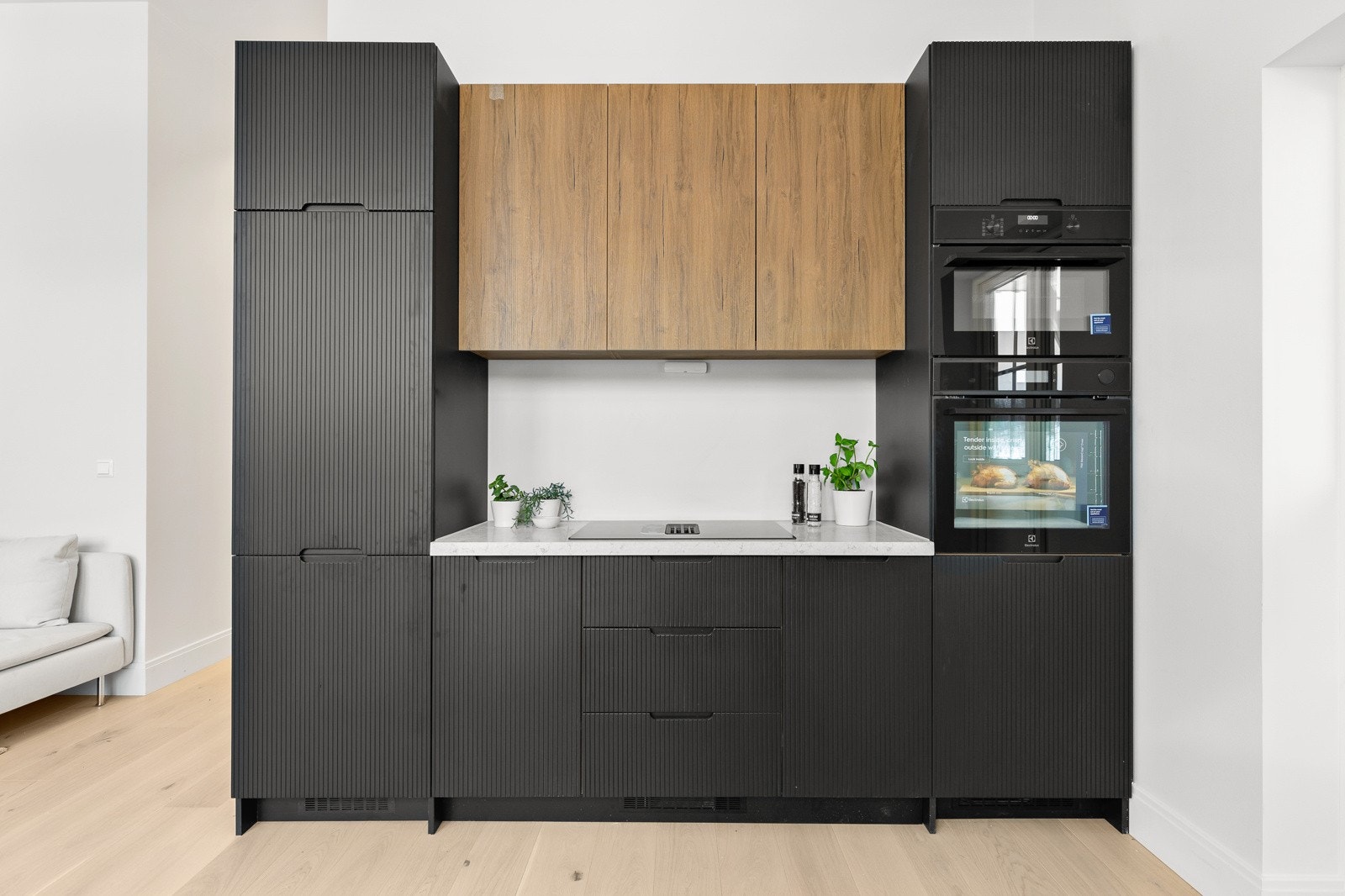 Stilren kjøkkeninnredning med stilfulle detaljer. Galleribilde