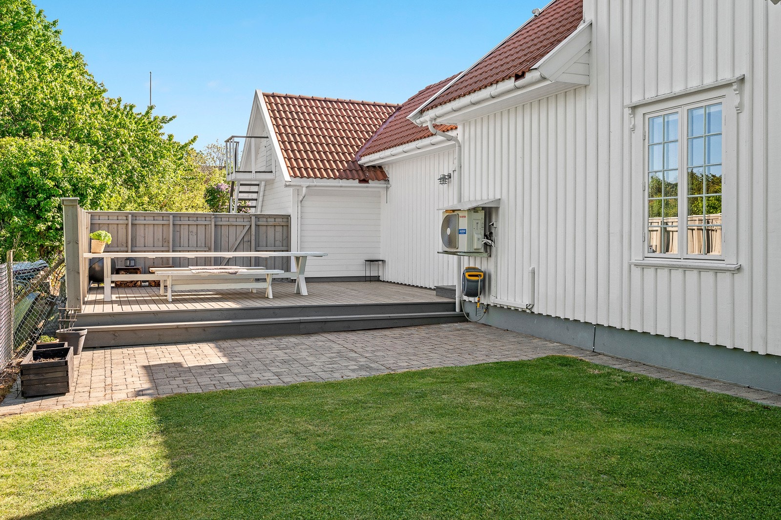 Skjermet hage i bakkant av boligen. Galleribilde