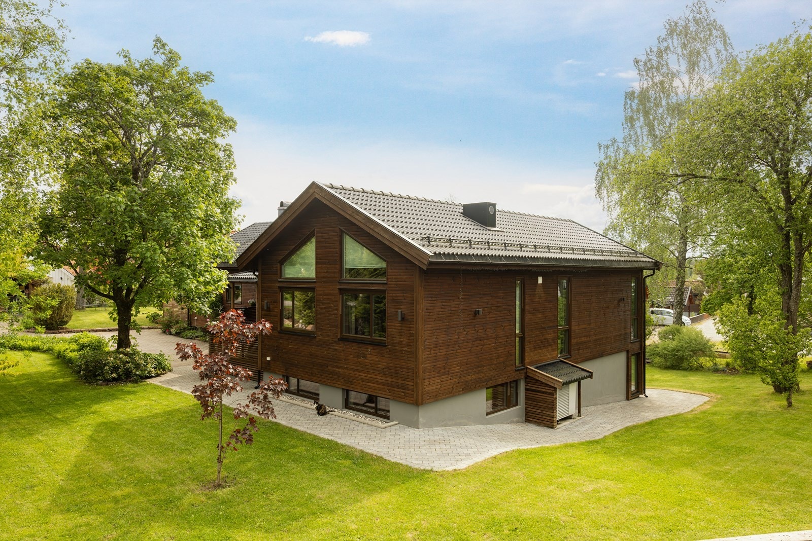 Oppgradert fasade med liggende trekledning og taktekking fra 2019. Galleribilde