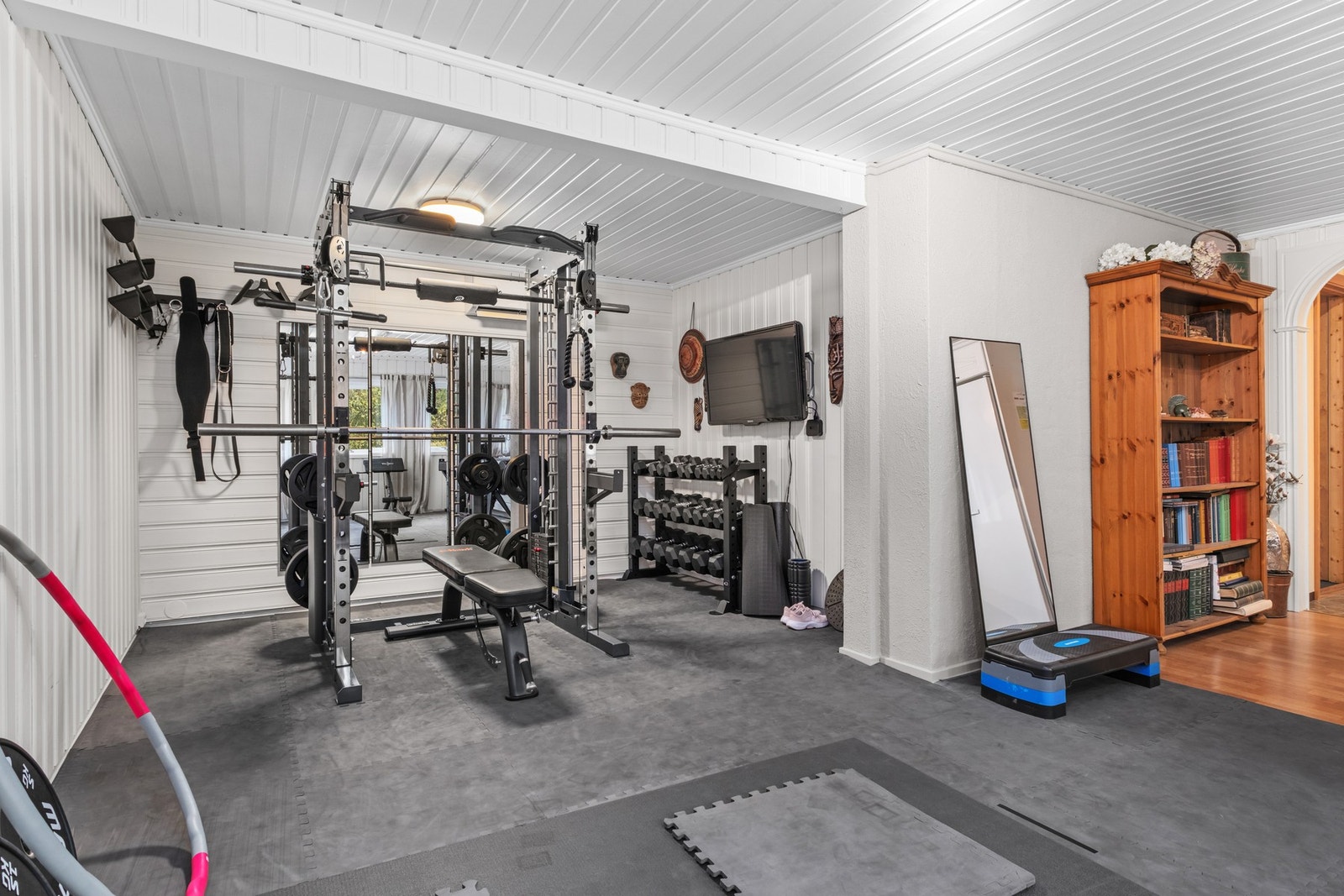 Utleiedelen er i dag brukt som treningsrom. Galleribilde