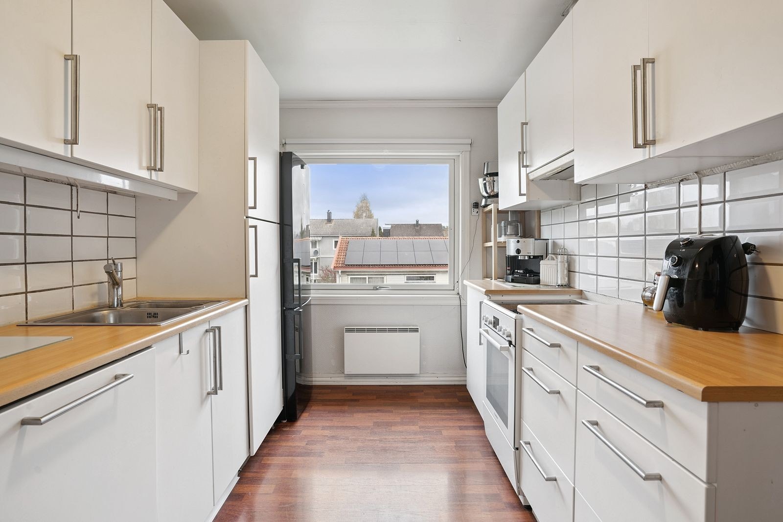 Praktisk kjøkkenløsning som kan moderniseres etter smak. Galleribilde