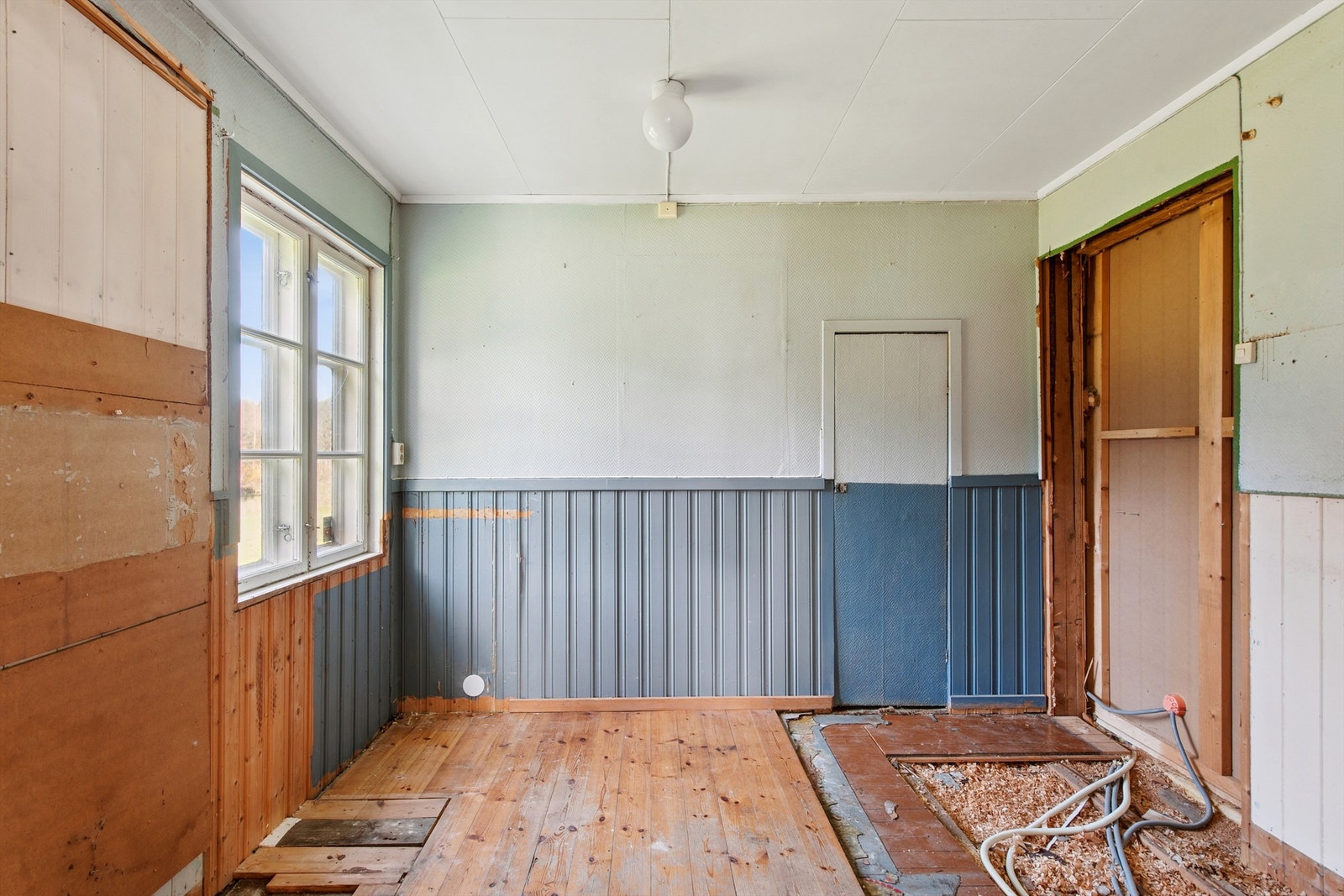 Uinnredet rom i bakkant av spisestuen. Galleribilde