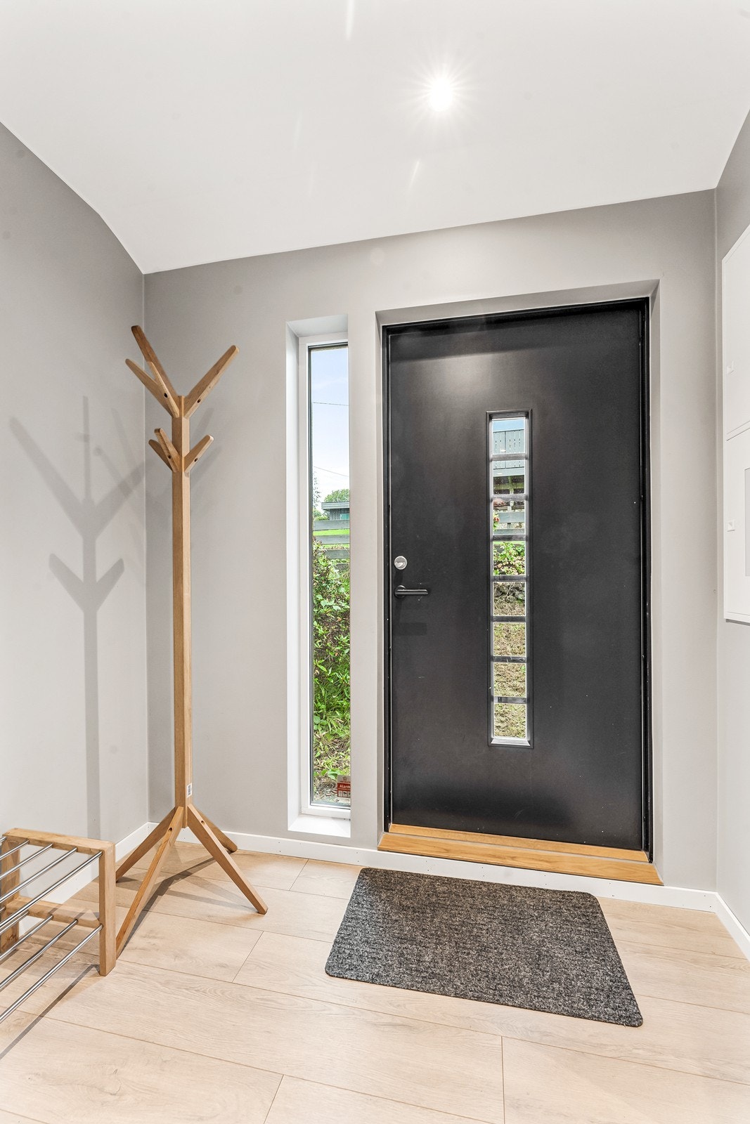 Entréen er romslig med god plass til yttertøy og sko. Galleribilde