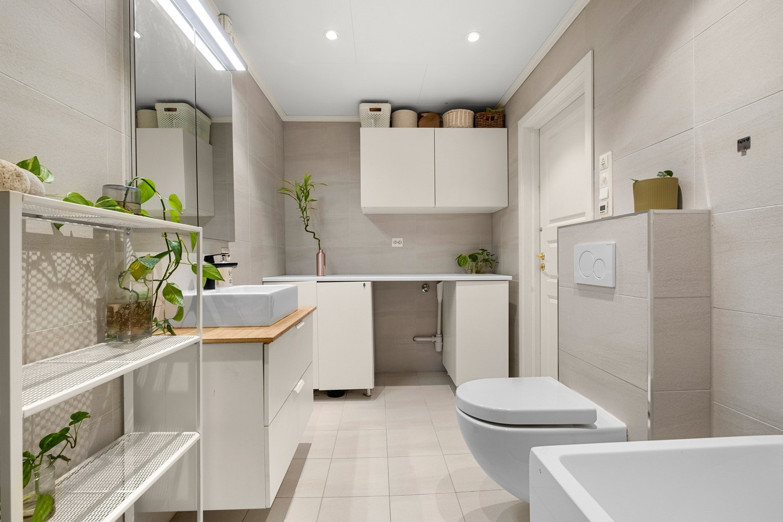 Badet har opplegg for vaskemaskin. Galleribilde