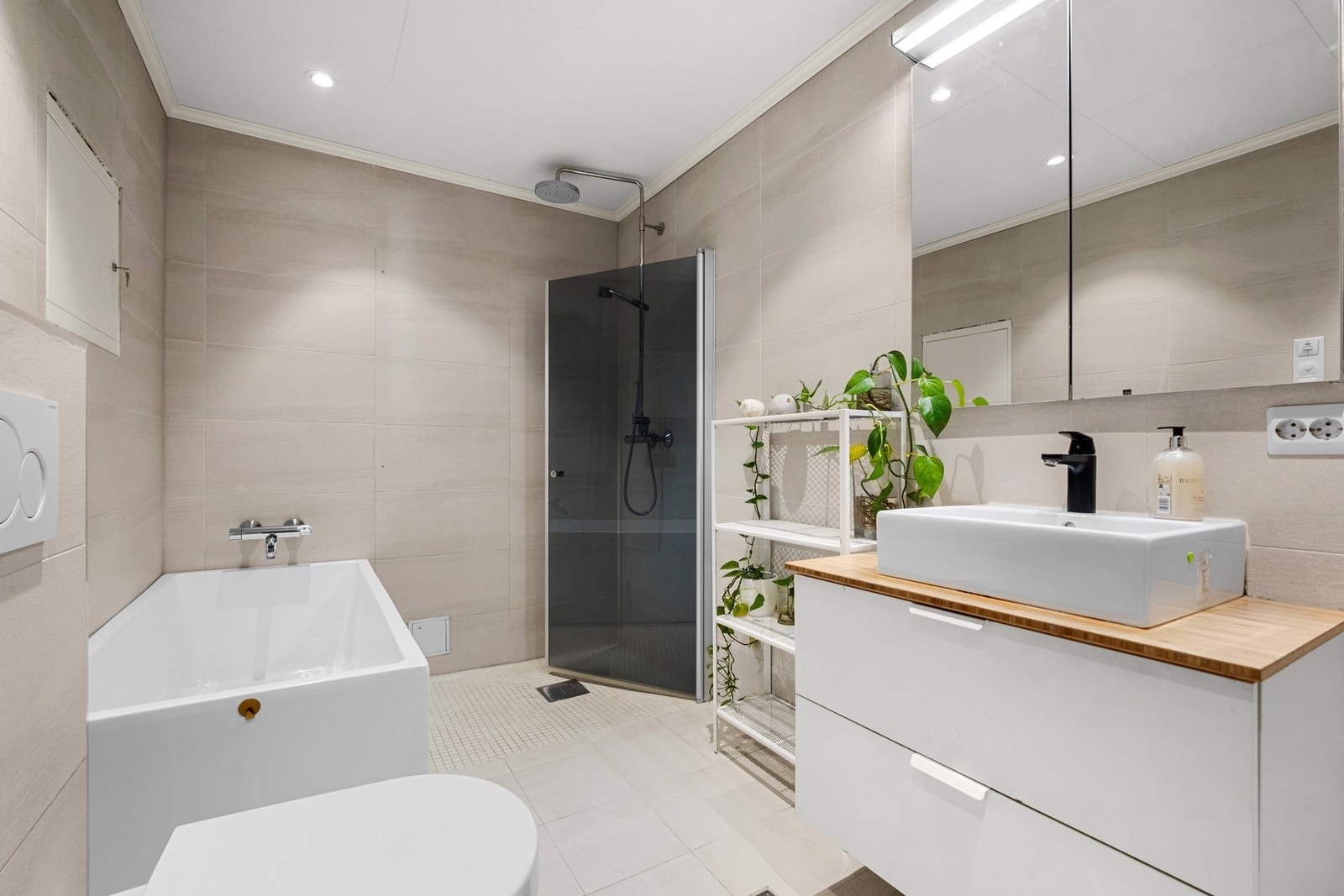 Pent flislagt bad på 7,5 kvm. Galleribilde