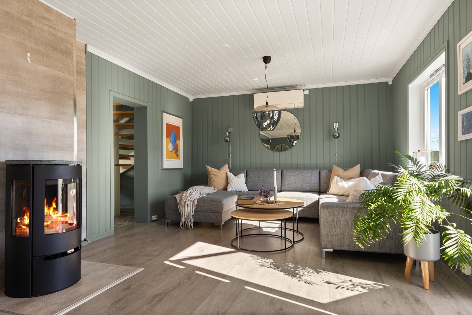 Peisovnen skaper en lun oppvarming til boligen. Galleribilde