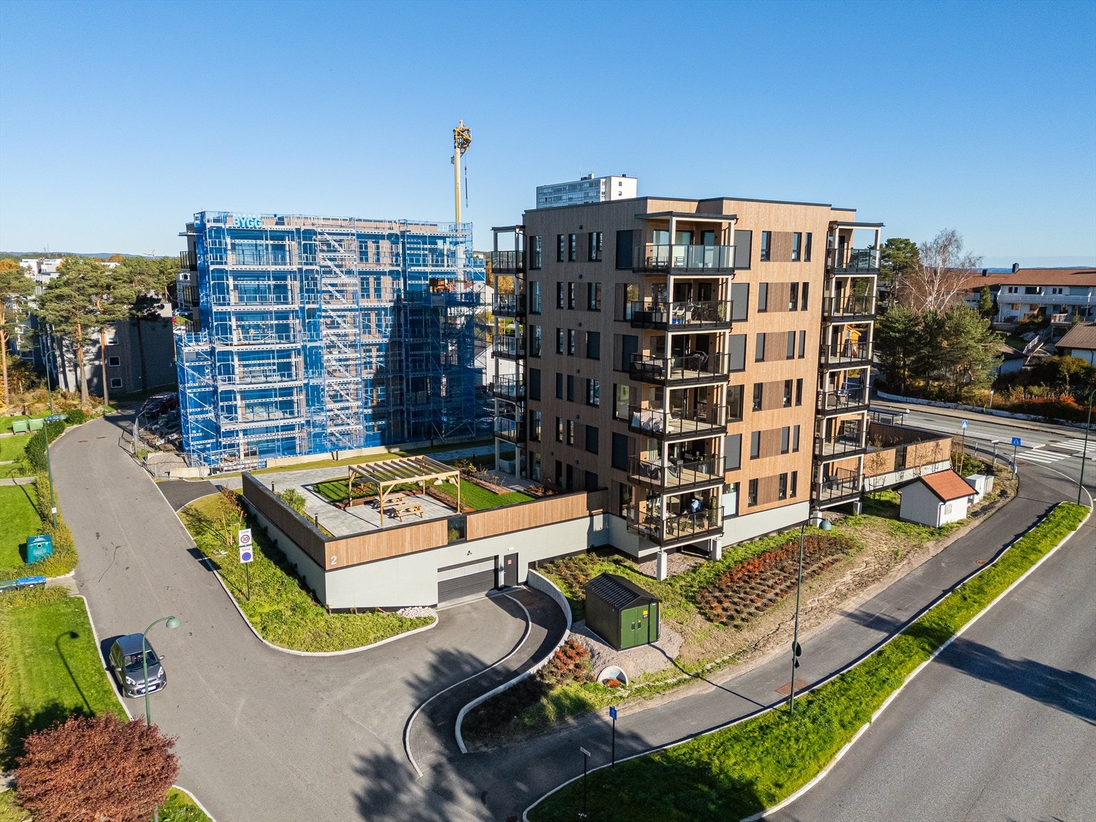 Fasade, leiligheten ligger i trinn 1, trinn 2 ses i bakgrunn Galleribilde