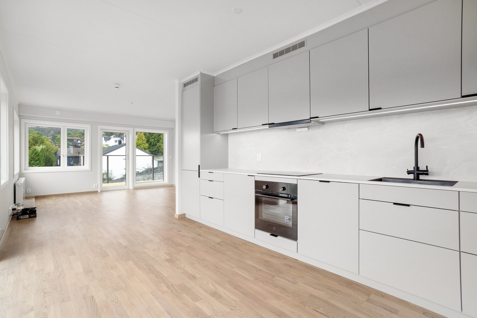 Selger har oppgradert leiligheten med lekre detaljer blant annet på kjøkken Galleribilde