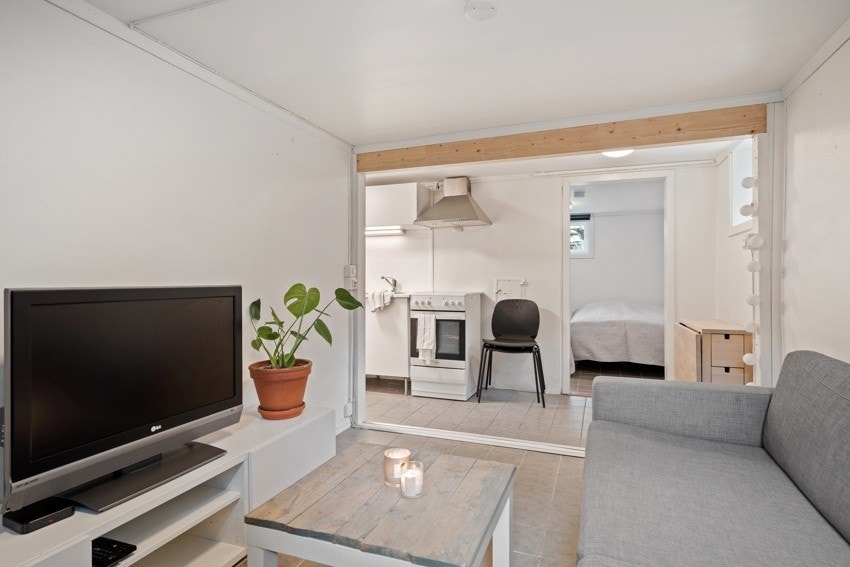 Åpen planløsning mellom stue og kjøkken Galleribilde