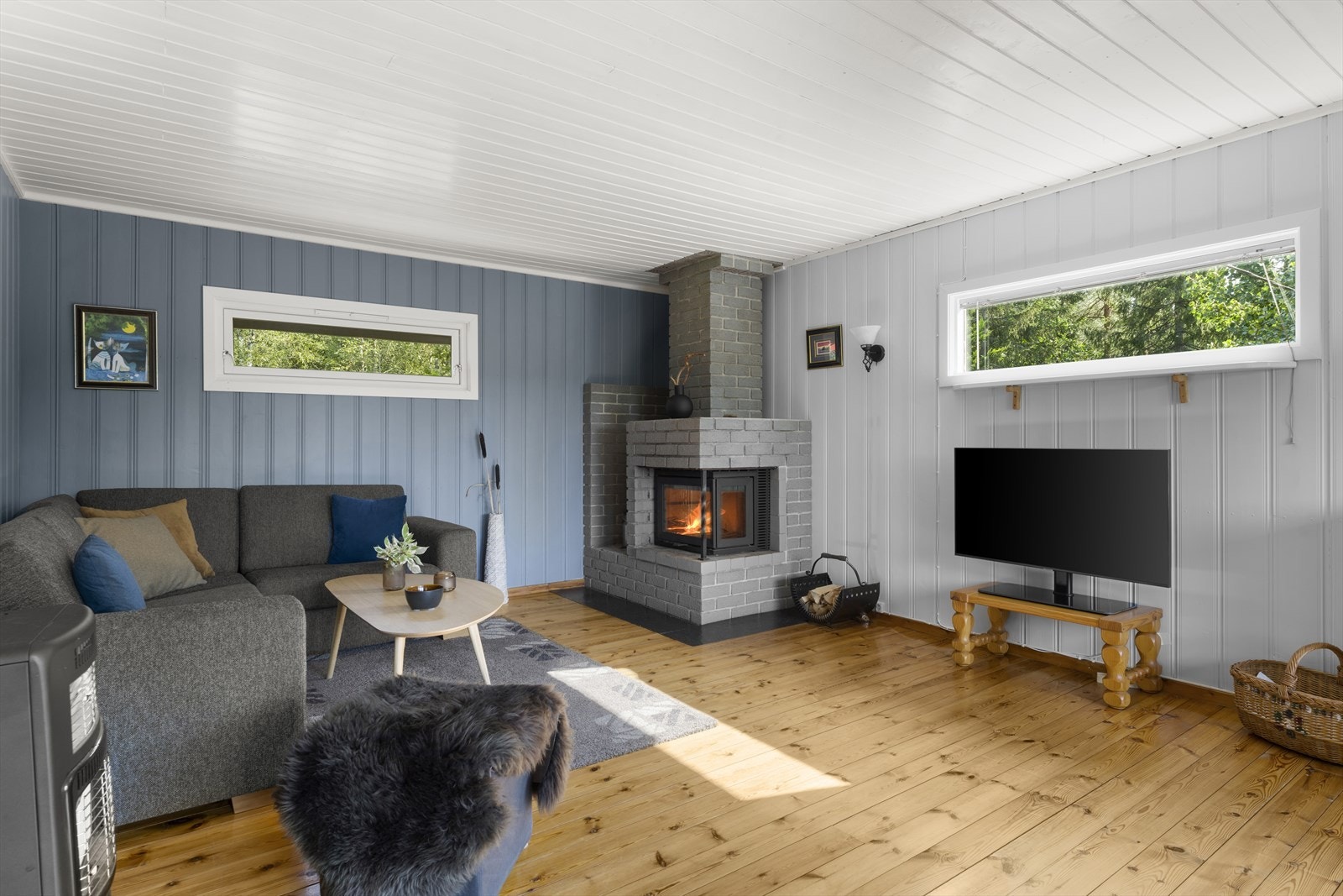 I stuen skaper peisen ekstra varme og en koselig atmosfære Galleribilde