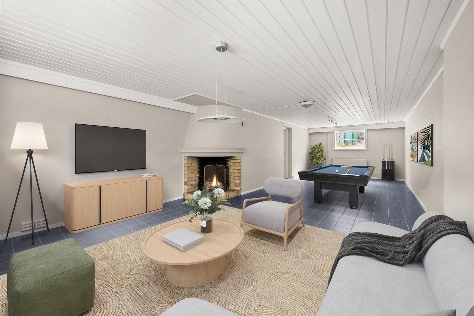 Rom benyttet som kjellerstue med god plass til både lek og hygge. Galleribilde