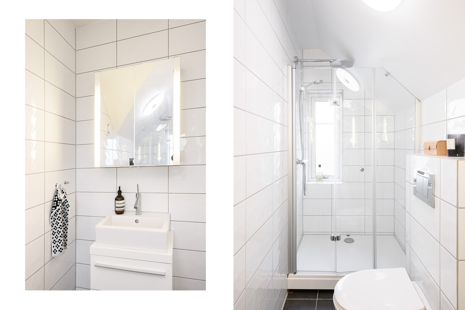 Et moderne og velholdt bad med flislagte overflater, varmekabler, vegghengt toalett, servant med underskap og speil med lys. Galleribilde