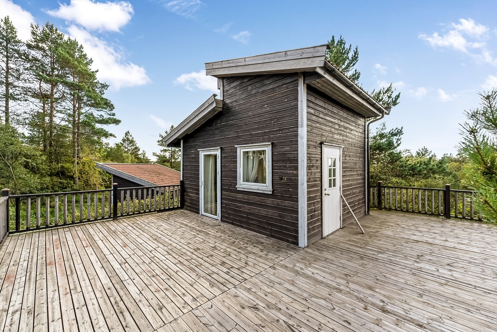 Bygg 2 - innredet med stue/soverom og bod. Galleribilde