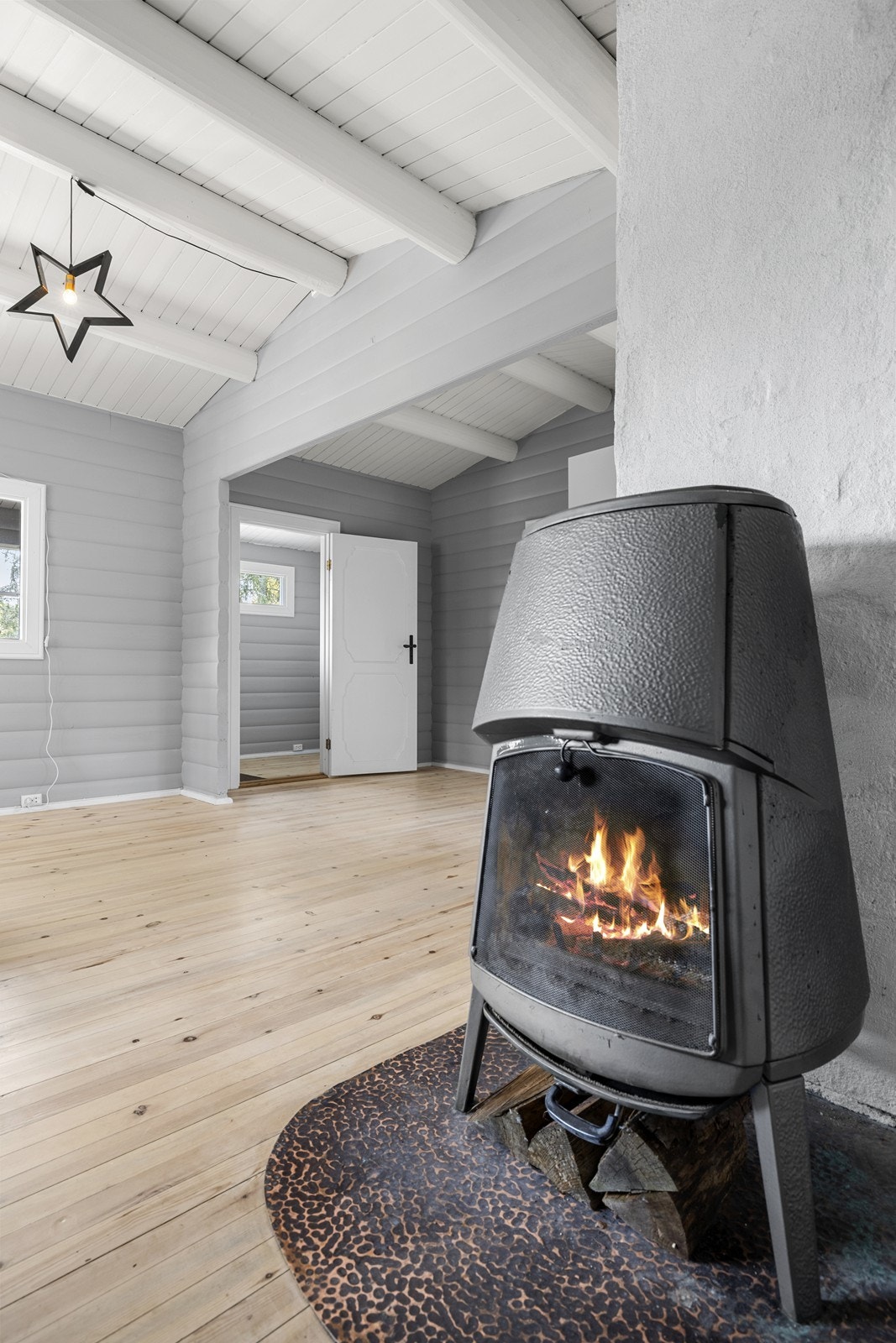 En peisovn er sentralt plassert for varme og hygge. Galleribilde