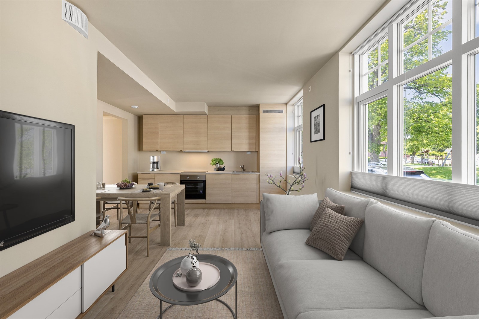 Store krysspostvinduer utgjør en klassisk og atmosfærefremmende kontrast til leilighetens moderne overflater og innredninger. Galleribilde