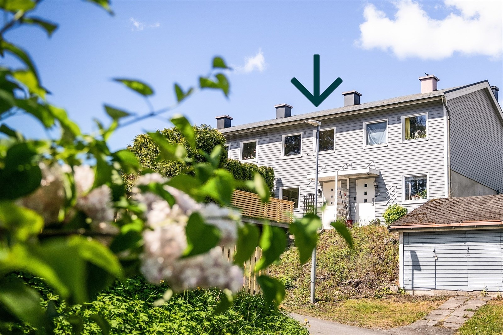 Rekkehuset ligger nest ytterst på rekken. Galleribilde