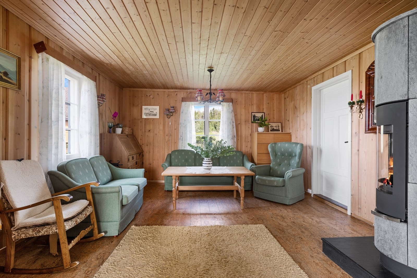 Stue med klebersteinspeis i kårboligen Galleribilde