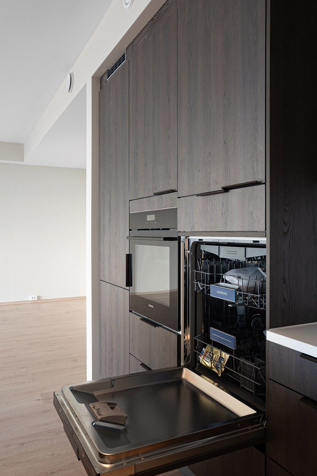 Høy oppvaskmaskin er svært praktisk Galleribilde