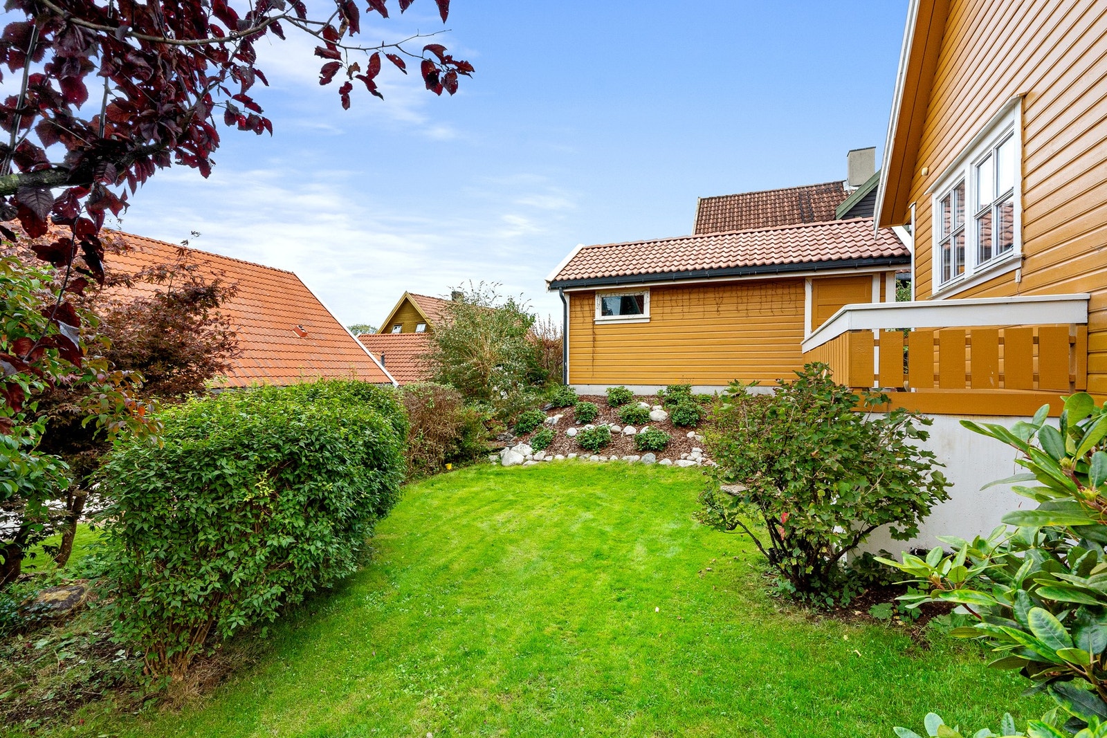 Inngang til utleiedel på baksiden Galleribilde