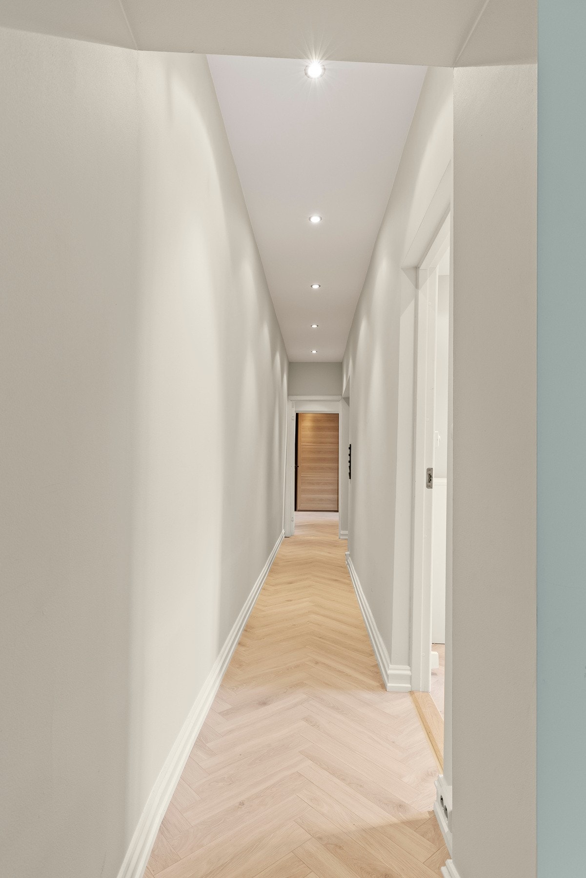 Leiligheten er holdt i lyse og delikate farger. Galleribilde