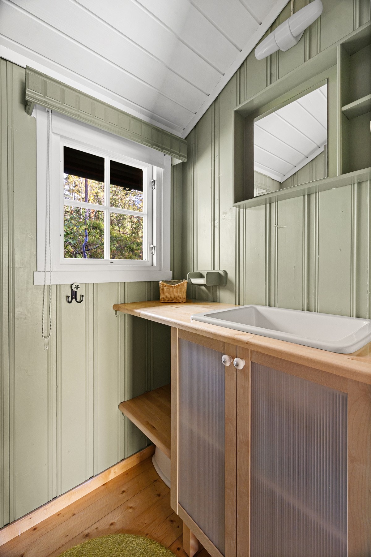 Praktisk stelle-/vaskerom som ble pusset opp i 2021. Galleribilde