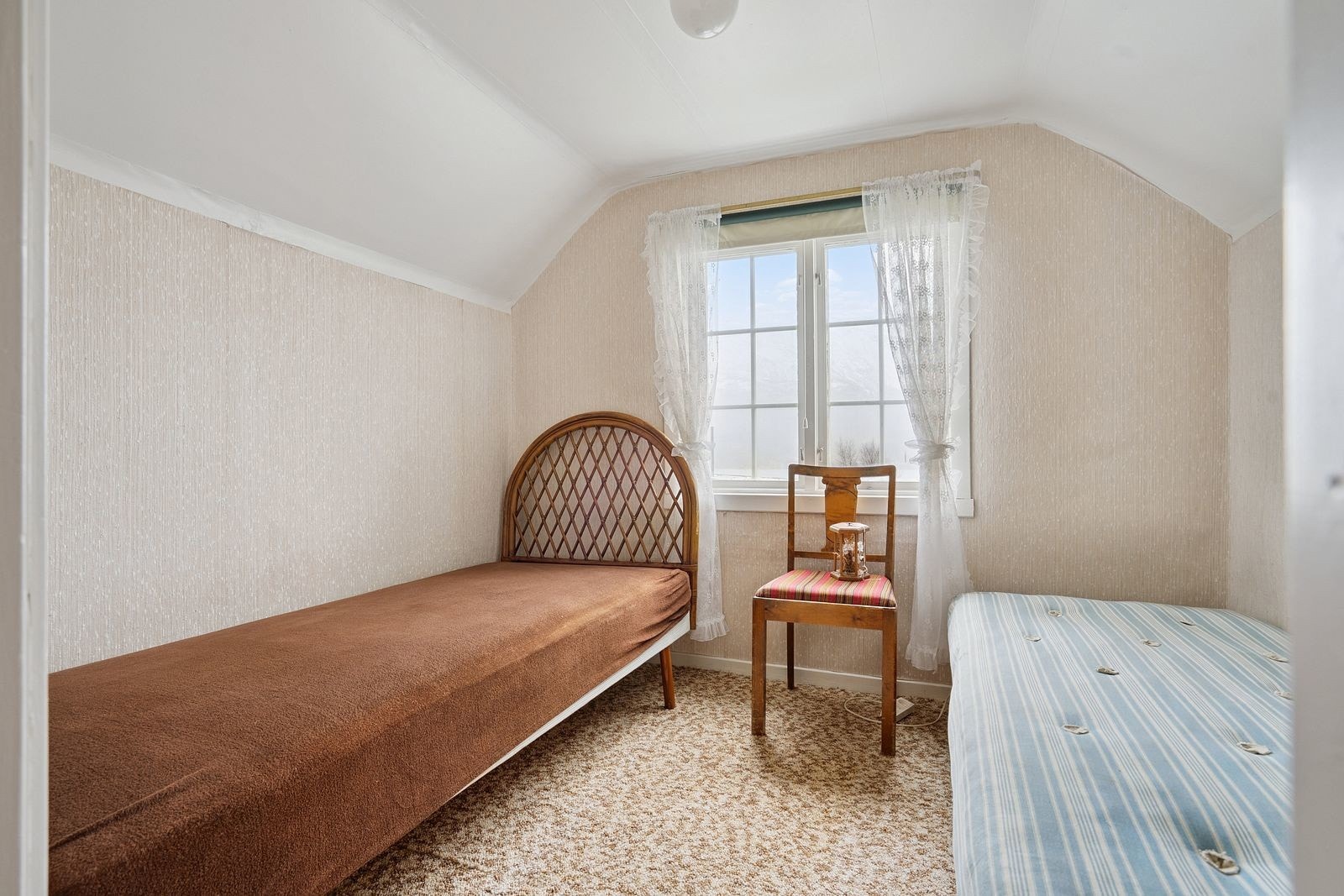 Ett av boligens fire soverom, i 2. etasje.