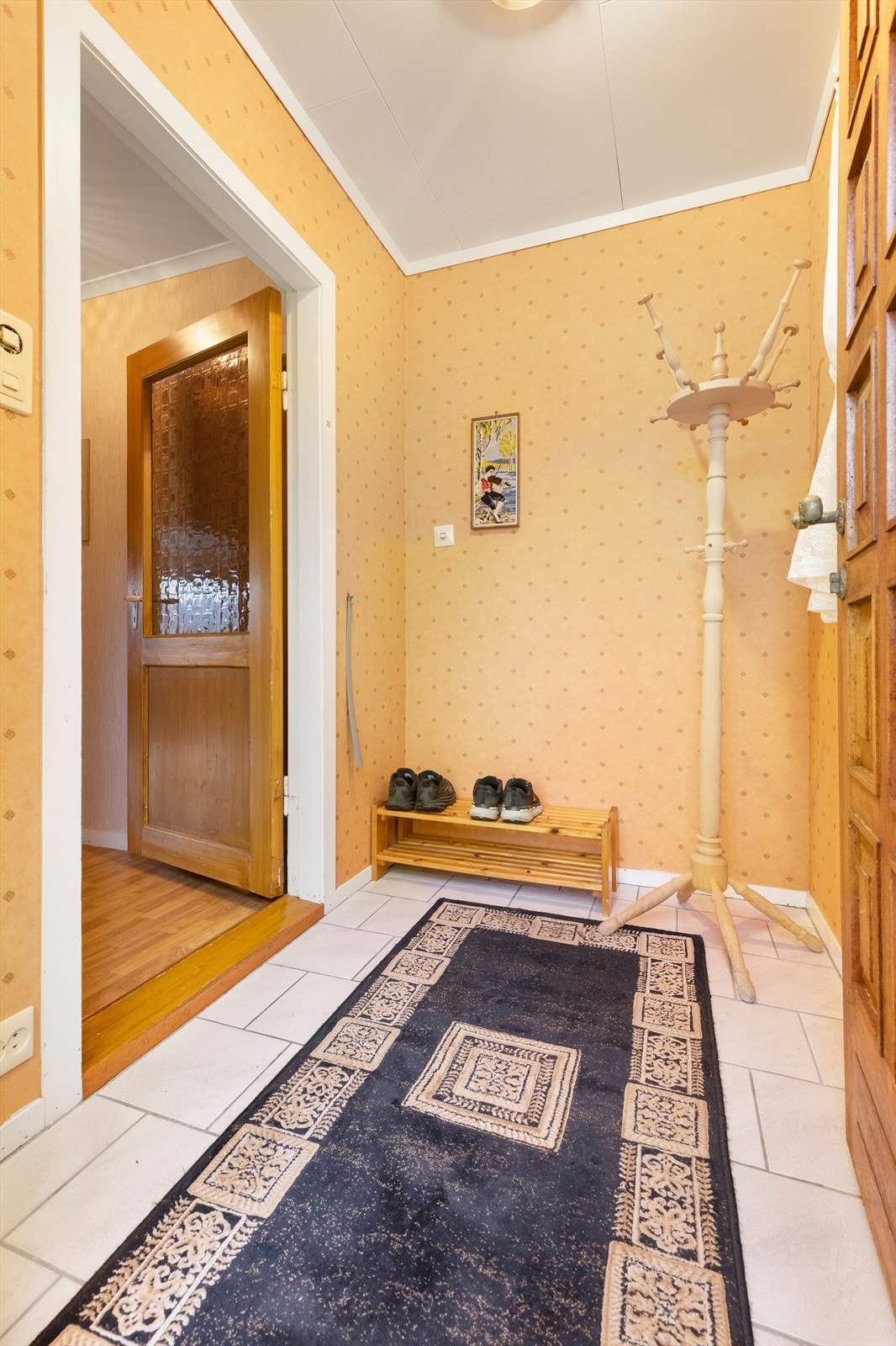 Flislagt gulv i vindfang Galleribilde