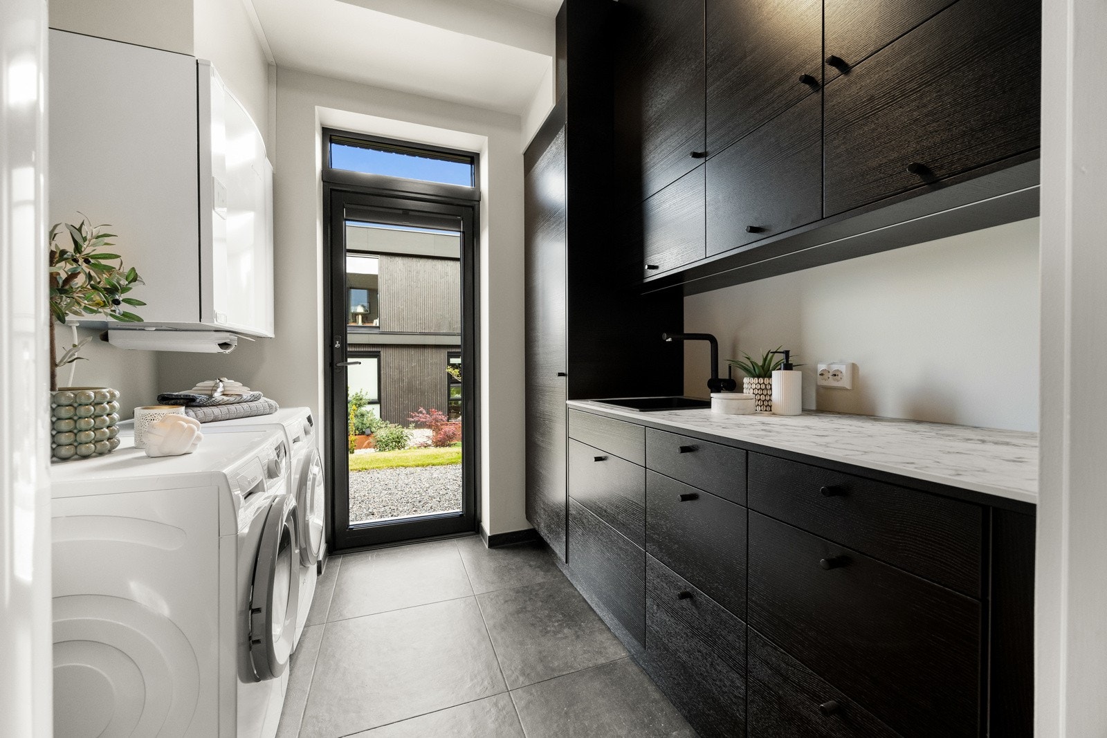 Vaskerommet har egen dør ut, noe som kan være ekstra praktisk for dyreeiere og turglade småbarnsfamilier. Galleribilde
