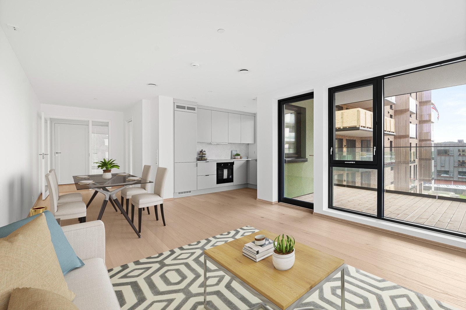 Digital møblering av stue og kjøkken. Store vindusflater. Galleribilde