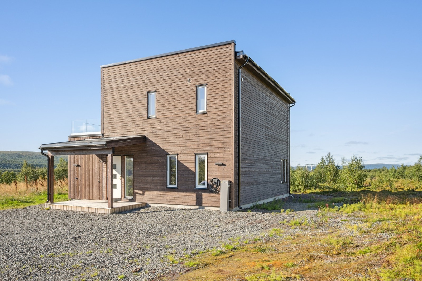 Fasade og overbygd inngangsparti Galleribilde