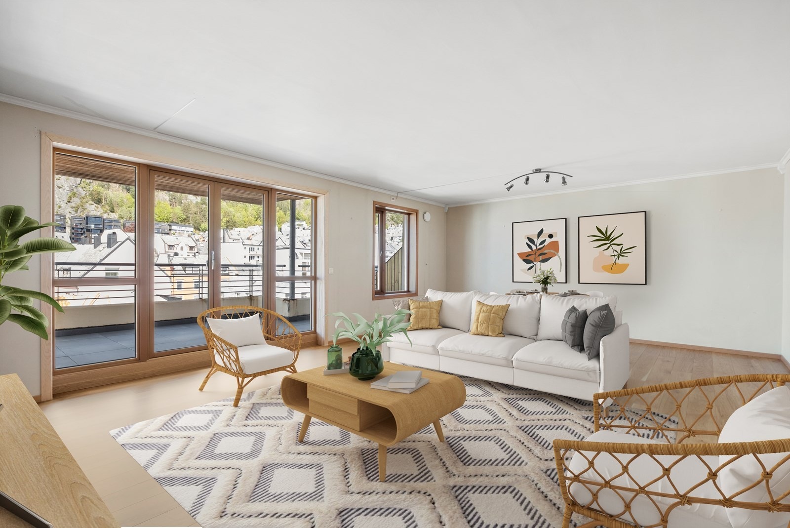 Stuen er stor og har plass til flere sittegrupper. Galleribilde