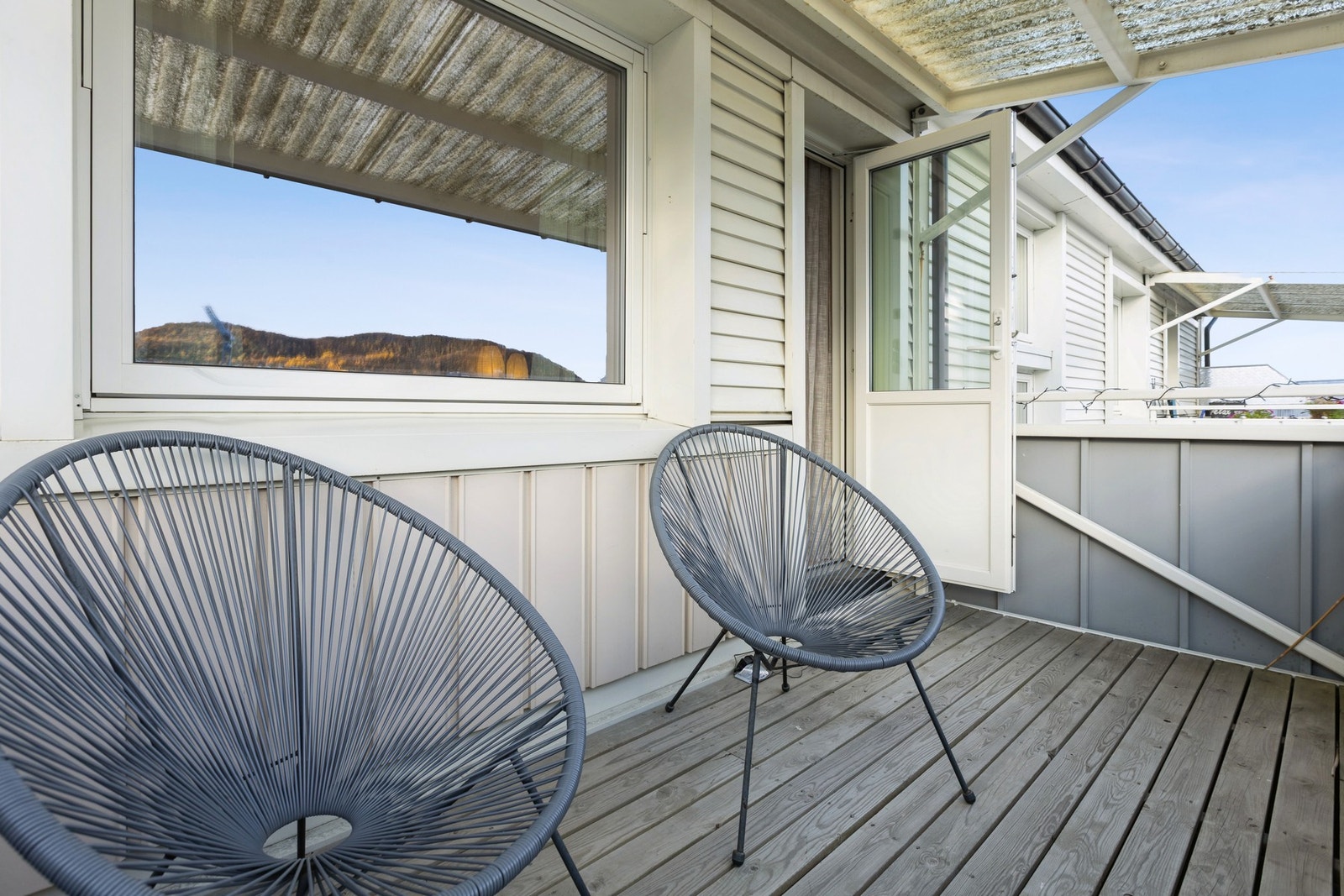 Her sitter du fint ute selv om det regner :-) Galleribilde