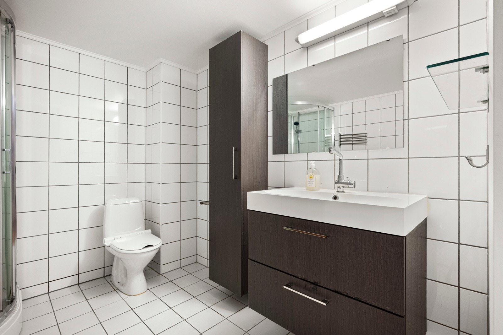 Flislagt bad med behagelig gulvvarme. Galleribilde