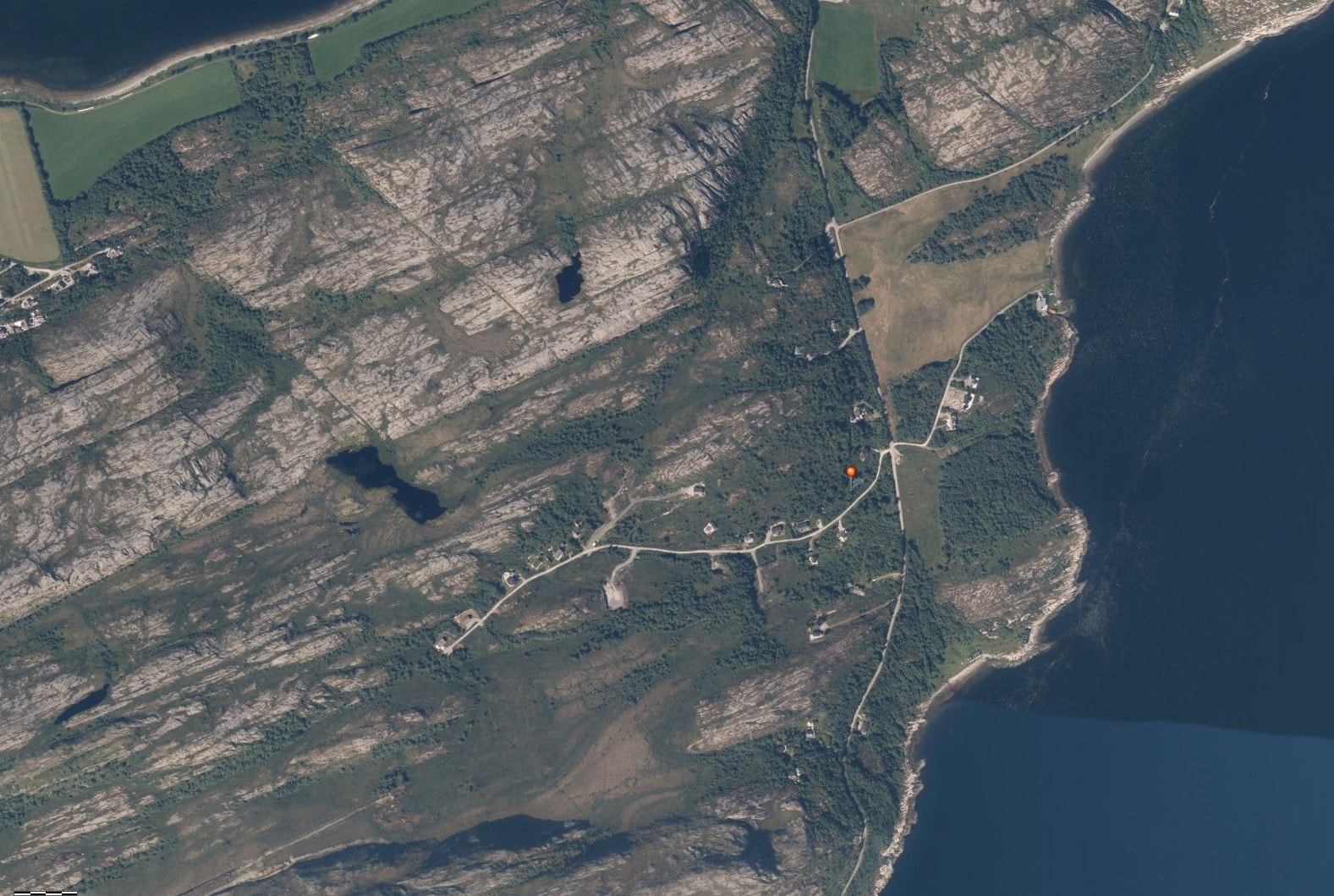 Luftfoto med tomten markert. Galleribilde