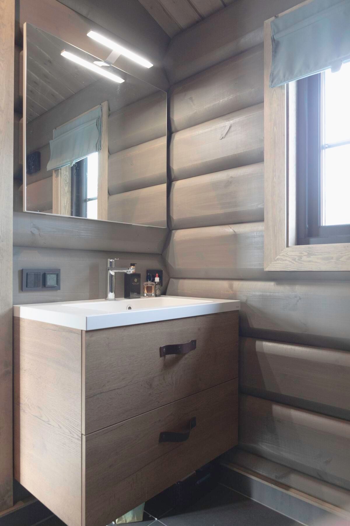 Foto fra bad i en av våre hyttemodeller. Galleribilde