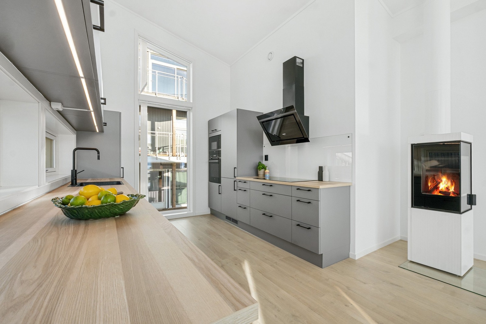 Moderne vedovn som gir behagelig varme og er et godt supplement til boligens energieffektive løsninger. Galleribilde