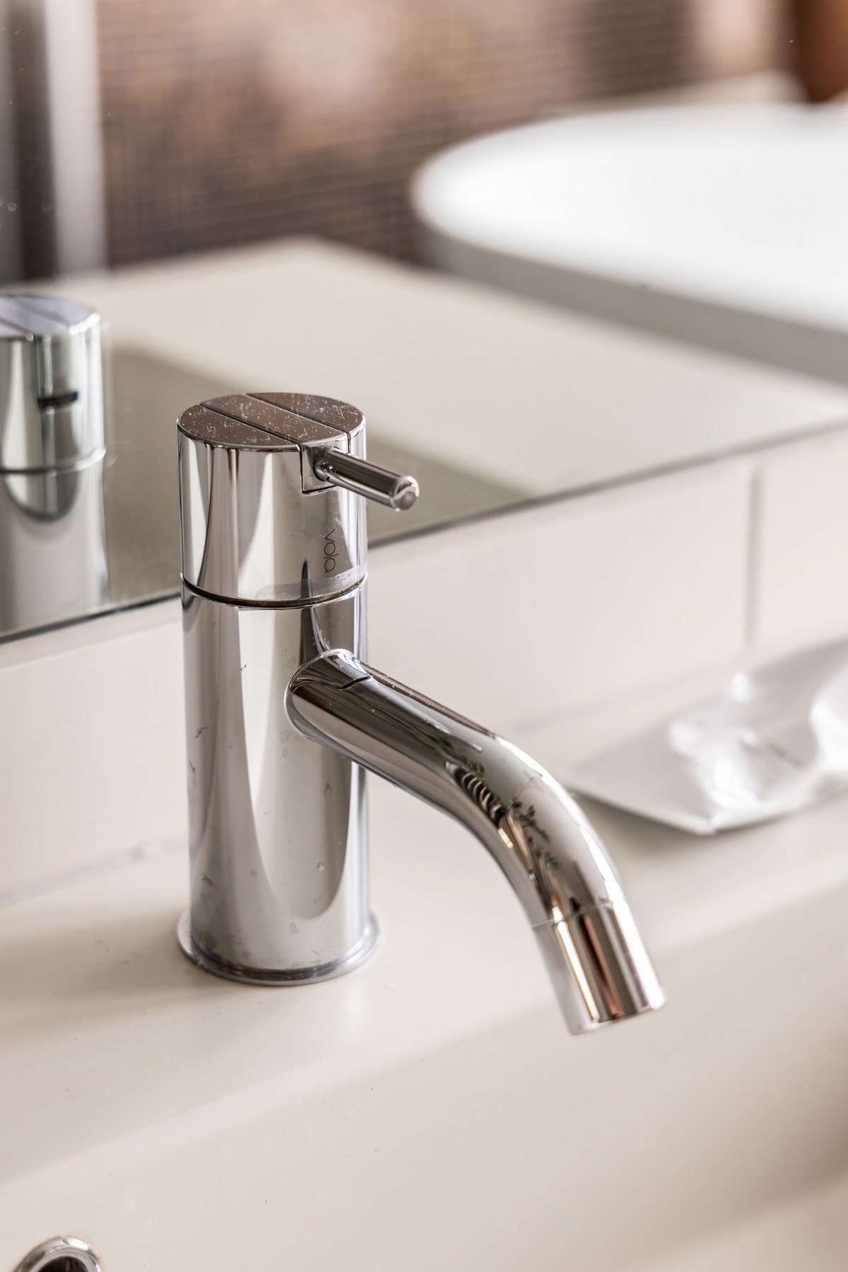 Gjennomført bruk av dansk design fra Vola på alle bad, samt på kjøkken. Galleribilde