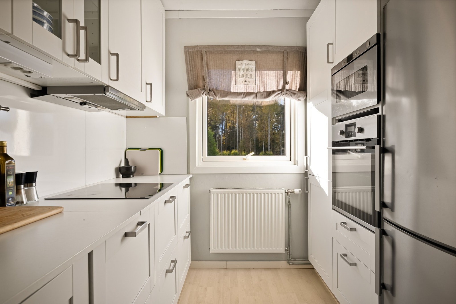 Et funksjonelt og trivelig kjøkken med plass til matglede i hverdagen Galleribilde