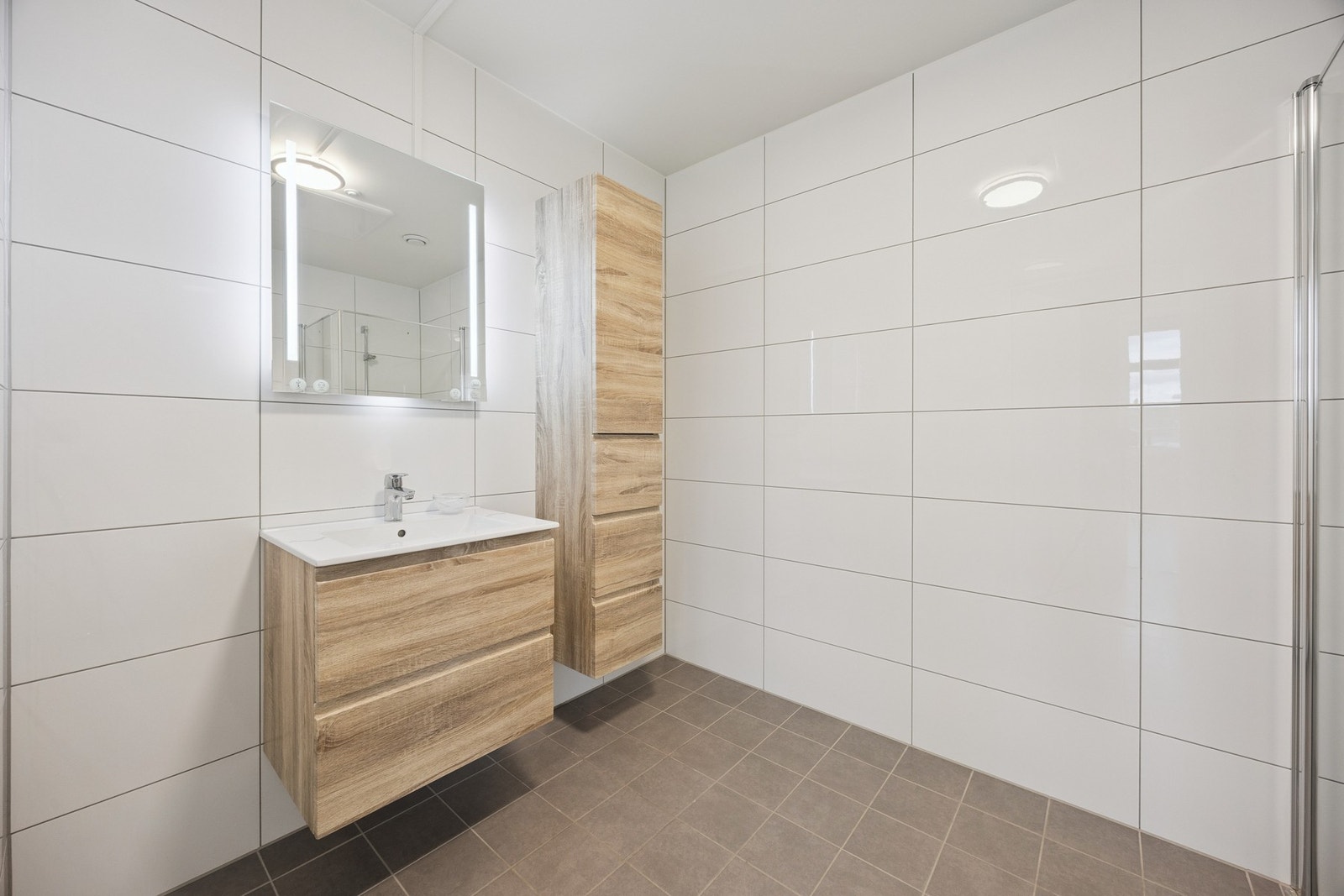 Flislagt bad med gulvvarme Galleribilde