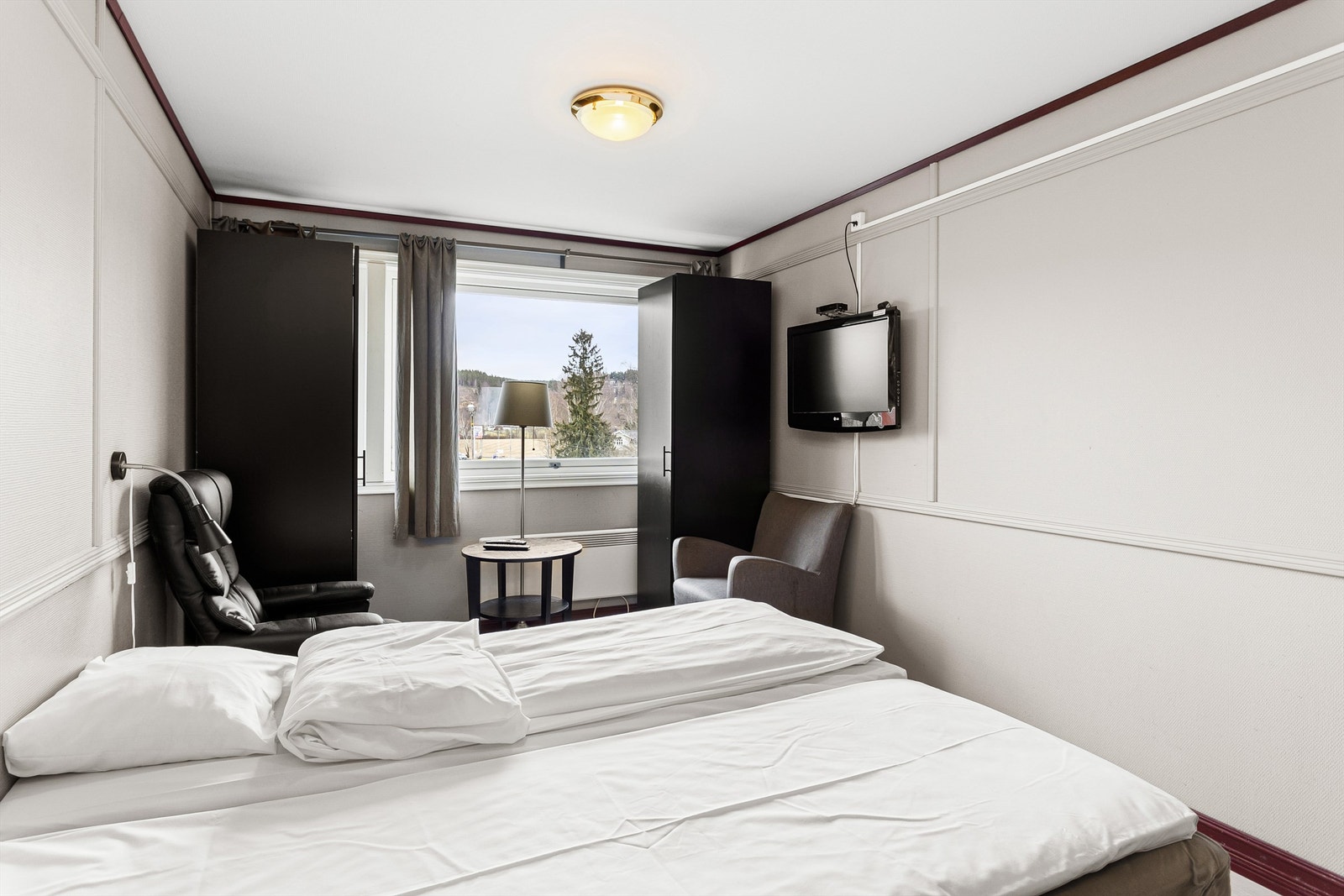 Alle leiligheter leies ut fullt møblert og har eget minikjøkken og flislagt bad. Galleribilde