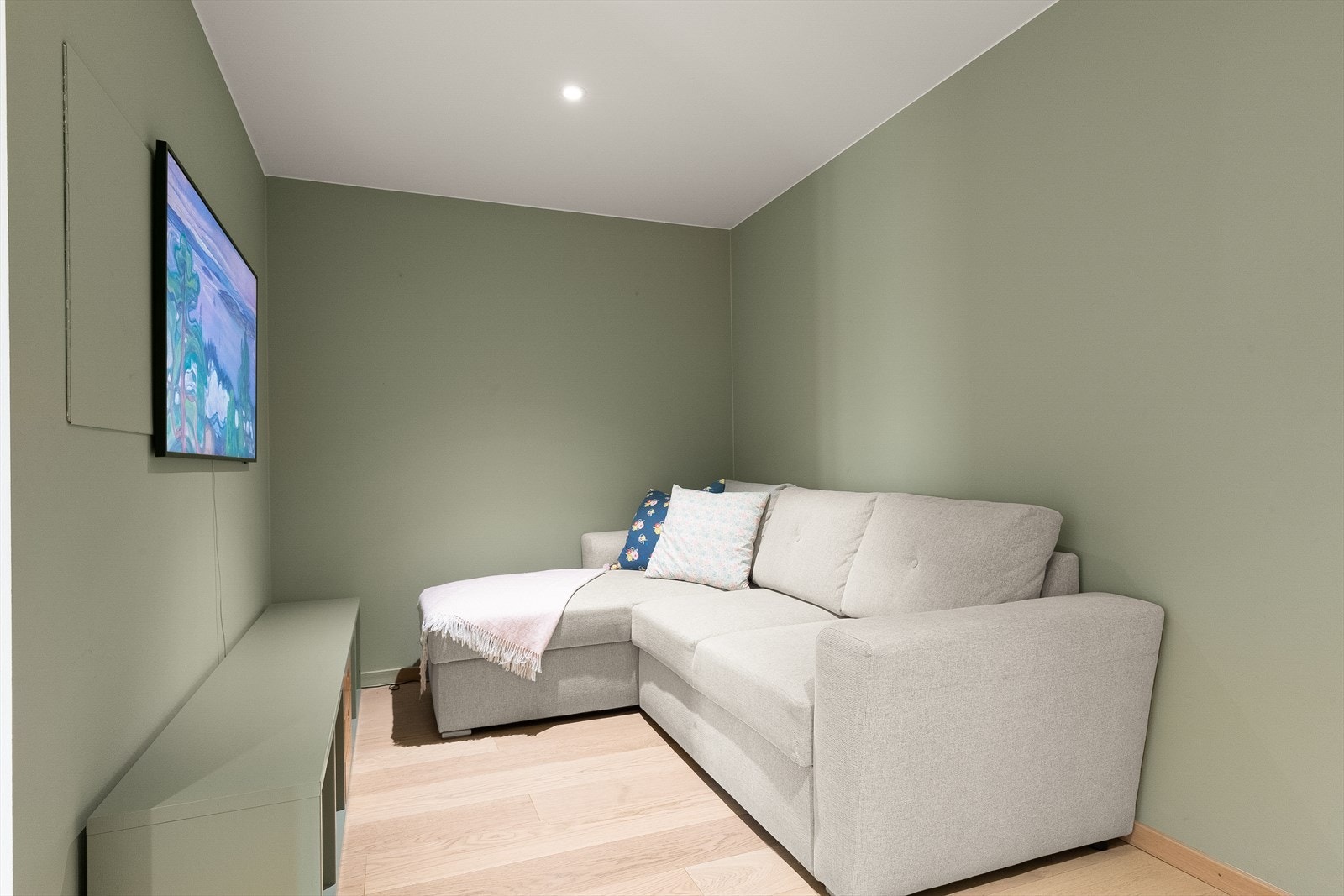 Boligens egne lille sofakrok. Her sitter man behagelig og skjermet fra resten av boligen. Galleribilde