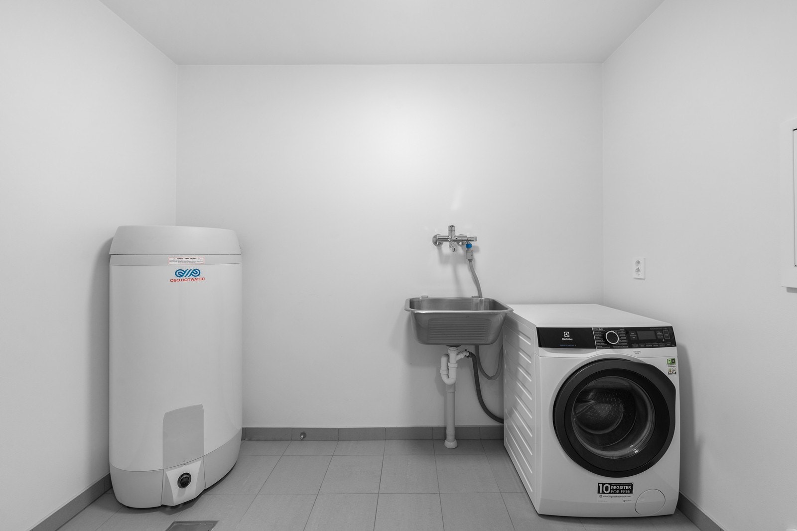 Praktisk og separat vaskerom Galleribilde